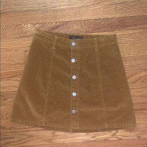 gold button skirt